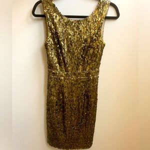 Beautiful sequined BCBG Maxazria XS dress. Only worn twice.